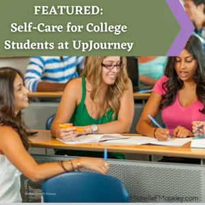 Three female-presenting college students sit at a table in a lecture hall, sharing notes and highlighting portions of the document in front of them.  