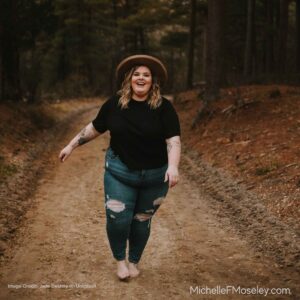 A woman with a larger body is walking down a path smiling and appearing joyful after healing from religious trauma.