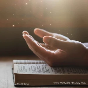 Hands are placed face up and open atop an open Bible to show seeking spiritual and emotional guidance.